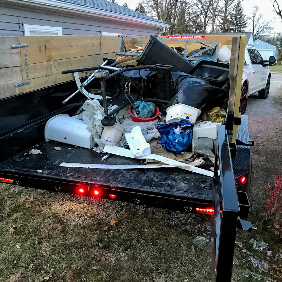 Roll-off dumpster delivered to a residential driveway in Mead